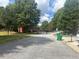Community street view with tree lined street at 5768 Windgate Ln, Lithonia, GA 30058