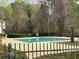 Community pool provides a refreshing escape, nestled amid lush greenery and serene surroundings at 2304 Northglenn Ct, Conyers, GA 30013