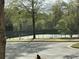 Well-maintained tennis courts offer a recreational space for active community members at 2304 Northglenn Ct, Conyers, GA 30013