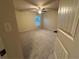 Cozy bedroom with carpet, a ceiling fan, and a window with blinds at 2304 Northglenn Ct, Conyers, GA 30013