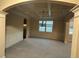 Dining room with coffered ceiling, wainscoting, carpeted floor, and natural light at 2304 Northglenn Ct, Conyers, GA 30013