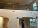 Bright, open foyer featuring a wrought iron railing and large windows at 2304 Northglenn Ct, Conyers, GA 30013