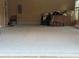 Spacious two-car garage with concrete flooring, suitable for parking and storage at 2304 Northglenn Ct, Conyers, GA 30013