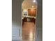 View of the kitchen, featuring stainless steel appliances, dark wood cabinets, and granite countertops at 2304 Northglenn Ct, Conyers, GA 30013