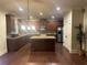 Well-lit kitchen with a large island, stainless steel appliances, and plenty of cabinet storage space at 2304 Northglenn Ct, Conyers, GA 30013