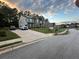 Street view captures modern homes with well-maintained landscaping and long driveways at 2304 Northglenn Ct, Conyers, GA 30013