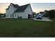 View of backyard with truck in driveway, patio and home's rear exterior at 3305 Wolverton Sw Ct, Conyers, GA 30094