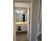 Bathroom vanity with a double sink and plenty of cabinets at 3305 Wolverton Sw Ct, Conyers, GA 30094