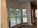 Bright dining area with ample natural light from large windows at 3305 Wolverton Sw Ct, Conyers, GA 30094