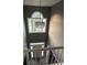 Stunning two story foyer with elegant chandelier and plenty of natural light at 3305 Wolverton Sw Ct, Conyers, GA 30094