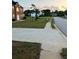 Well-kept two-story brick home with an expansive front yard and concrete driveway at 3305 Wolverton Sw Ct, Conyers, GA 30094