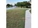 Well-maintained front yard with a paved walkway in a serene neighborhood setting at 3305 Wolverton Sw Ct, Conyers, GA 30094