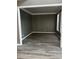 The living room offers sleek floors, neutral wall paint and trim at 3305 Wolverton Sw Ct, Conyers, GA 30094