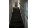 Carpeted staircase leading to upper floors at 3305 Wolverton Sw Ct, Conyers, GA 30094