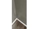 Close-up of gray wall and flooring showing the corner of a room at 3305 Wolverton Sw Ct, Conyers, GA 30094