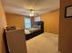 Bedroom with painted orange walls, ceiling fan, and a full sized bed at 1657 Stilesboro Ridge Dr, Kennesaw, GA 30152