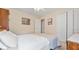 Cozy bedroom with a bed, double closet, and neutral color scheme at 1657 Stilesboro Ridge Dr, Kennesaw, GA 30152