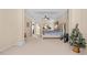 Spacious primary bedroom boasts tray ceilings, neutral carpet, and a ceiling fan at 1657 Stilesboro Ridge Dr, Kennesaw, GA 30152