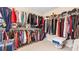 Large walk-in closet with shelving and clothing racks for optimal organization at 1657 Stilesboro Ridge Dr, Kennesaw, GA 30152