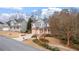 Charming street view of a two-story home with a well-maintained front yard at 1657 Stilesboro Ridge Dr, Kennesaw, GA 30152