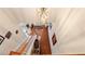 Bright foyer with wooden floors, staircase, and chandelier at 1657 Stilesboro Ridge Dr, Kennesaw, GA 30152