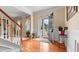 Bright foyer with hardwood floors, elegant molding, and an open doorway, creating an inviting entrance to the home at 1657 Stilesboro Ridge Dr, Kennesaw, GA 30152