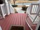 Charming front porch with a rocking chair and a 'welcome' mat at 1657 Stilesboro Ridge Dr, Kennesaw, GA 30152