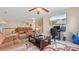 Comfortable living area featuring an entertainment center, and cozy leather reclining sofa at 1657 Stilesboro Ridge Dr, Kennesaw, GA 30152