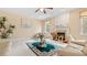 Inviting living room with a fireplace, neutral colors, and ample natural light at 1657 Stilesboro Ridge Dr, Kennesaw, GA 30152