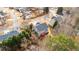 A suburban house boasts a well-maintained backyard with a deck and mature trees at 1657 Stilesboro Ridge Dr, Kennesaw, GA 30152