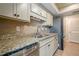 Kitchen with granite countertops, stainless steel appliances, and tiled backsplash at 3205 Canyon Point Cir, Roswell, GA 30076