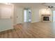 Inviting living room with fireplace, hardwood floors, and neutral colors, perfect for relaxation at 3205 Canyon Point Cir, Roswell, GA 30076