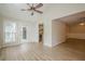 Bright living room featuring new floors, neutral walls, ceiling fan and lots of natural light at 3205 Canyon Point Cir, Roswell, GA 30076