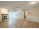 Bright, open living area featuring fireplace, modern flooring, and ample natural light at 3205 Canyon Point Cir, Roswell, GA 30076