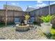 The backyard patio has a fire pit and ample seating at 6048 Prodigy Ln, Locust Grove, GA 30248