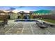 A backyard view of a beautiful pool with a slide feature at 6048 Prodigy Ln, Locust Grove, GA 30248