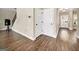 Welcoming entryway with stylish hardwood flooring and neutral wall paint at 6048 Prodigy Ln, Locust Grove, GA 30248