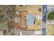 Aerial view of a home with a fenced backyard and mature trees in a residential neighborhood at 2275 Perch Sw Way, Marietta, GA 30008