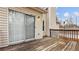 Side view of the wooden deck showcasing access to the home through a sliding glass door at 2275 Perch Sw Way, Marietta, GA 30008