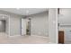 Spacious carpeted basement featuring access to storage and utility areas at 2275 Perch Sw Way, Marietta, GA 30008
