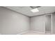 Open basement area with neutral carpeting, and one door way at 2275 Perch Sw Way, Marietta, GA 30008