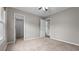 Bedroom with carpeted floors, closet and ensuite access with neutral colored walls at 2275 Perch Sw Way, Marietta, GA 30008