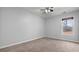 Bedroom with carpeted floors and a window that offers ample natural light at 2275 Perch Sw Way, Marietta, GA 30008