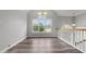 Bright dining room area with hardwood floors and ample natural light through large windows at 2275 Perch Sw Way, Marietta, GA 30008
