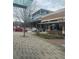 Building with CityBar sign, modern design, and patio area, appealing to those seeking city amenities at 300 Johnson Ferry Ne Rd # B401, Atlanta, GA 30328