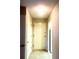 Bright entryway with a white front door and access to a modern kitchen at 300 Johnson Ferry Ne Rd # B401, Atlanta, GA 30328