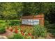 Mount Vernon Towers signage with a floral display and shrubbery at 300 Johnson Ferry Ne Rd # B401, Atlanta, GA 30328