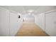 Long attic space featuring white walls and carpeted flooring at 1903 Olde Village Run, Dunwoody, GA 30338