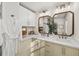 Bathroom boasting double sinks, modern fixtures, and a sleek countertop at 1903 Olde Village Run, Dunwoody, GA 30338