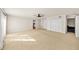 Large bedroom featuring a ceiling fan, neutral paint and access to other areas at 1903 Olde Village Run, Dunwoody, GA 30338